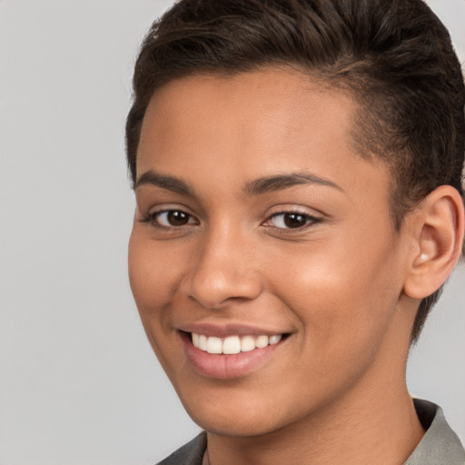 Joyful white young-adult female with short  brown hair and brown eyes