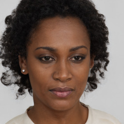 Neutral black young-adult female with short  brown hair and brown eyes