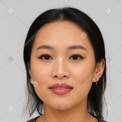 Joyful asian young-adult female with medium  black hair and brown eyes