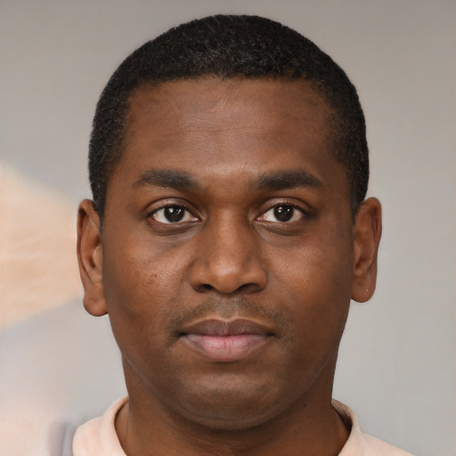 Neutral black young-adult male with short  brown hair and brown eyes