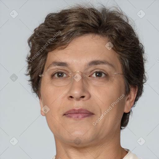 Joyful white adult female with short  brown hair and brown eyes