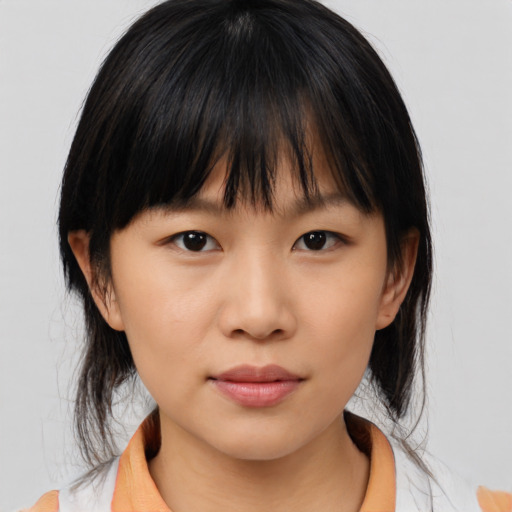 Neutral asian child female with medium  brown hair and brown eyes