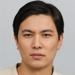 Neutral asian young-adult male with short  brown hair and brown eyes