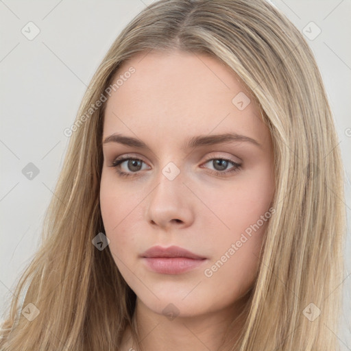 Neutral white young-adult female with long  brown hair and brown eyes