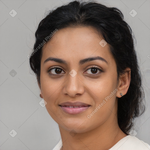 Joyful latino young-adult female with medium  black hair and brown eyes