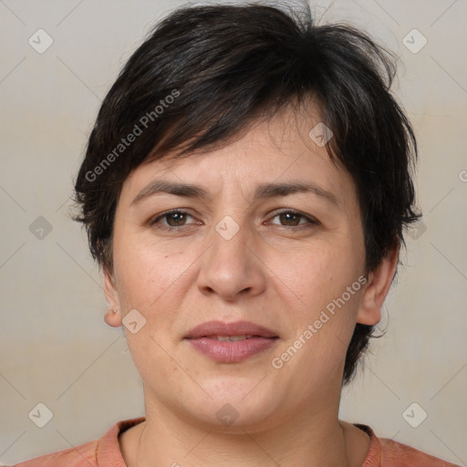 Joyful white adult female with medium  brown hair and brown eyes