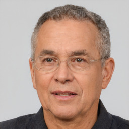 Joyful white middle-aged male with short  brown hair and brown eyes