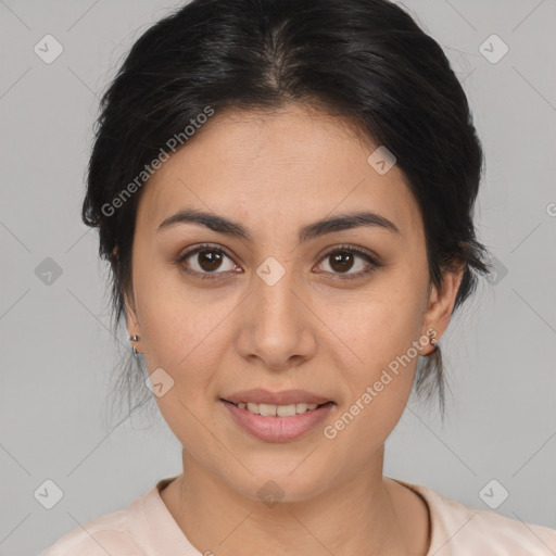 Joyful latino young-adult female with medium  brown hair and brown eyes