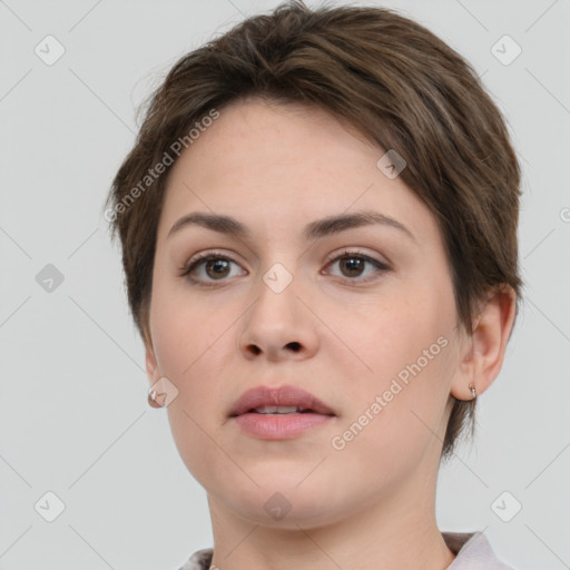 Neutral white young-adult female with short  brown hair and brown eyes