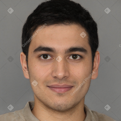 Joyful latino young-adult male with short  brown hair and brown eyes