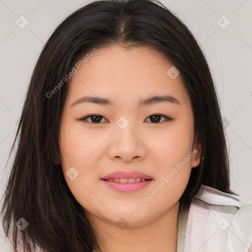 Joyful asian young-adult female with long  brown hair and brown eyes