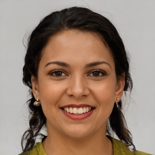 Joyful white young-adult female with medium  brown hair and brown eyes