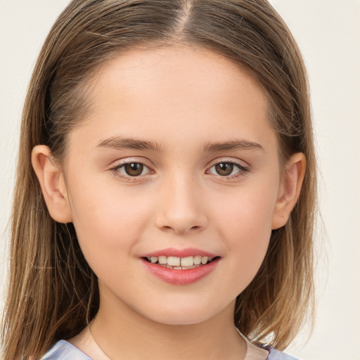 Joyful white child female with long  brown hair and brown eyes