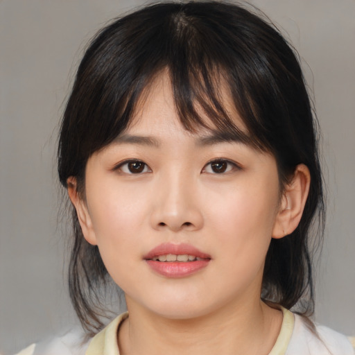 Neutral asian young-adult female with medium  brown hair and brown eyes