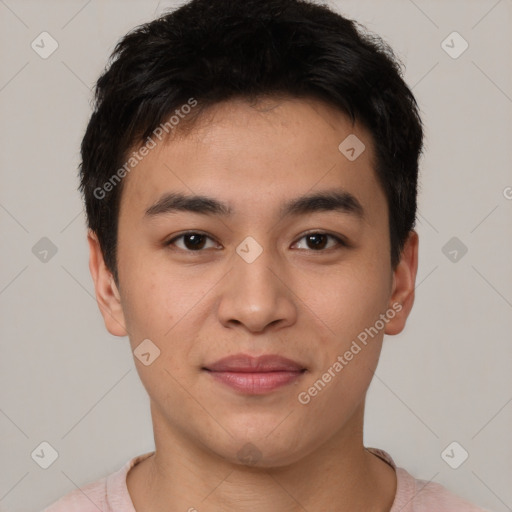 Joyful asian young-adult male with short  brown hair and brown eyes