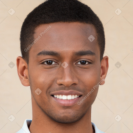 Joyful black young-adult male with short  brown hair and brown eyes