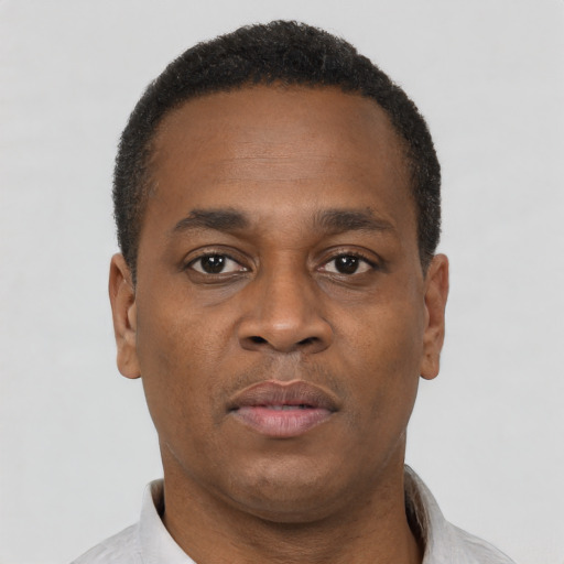 Neutral black young-adult male with short  brown hair and brown eyes