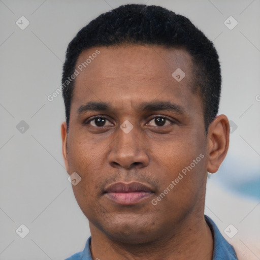 Neutral latino young-adult male with short  black hair and brown eyes