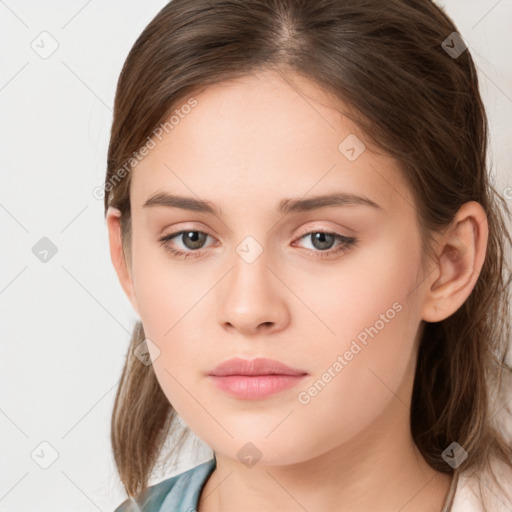 Neutral white young-adult female with long  brown hair and brown eyes