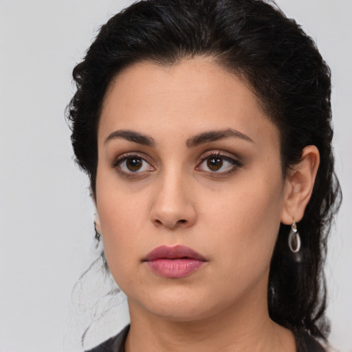 Neutral white young-adult female with long  brown hair and brown eyes