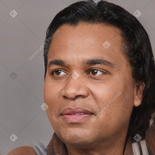 Joyful black adult male with short  black hair and brown eyes