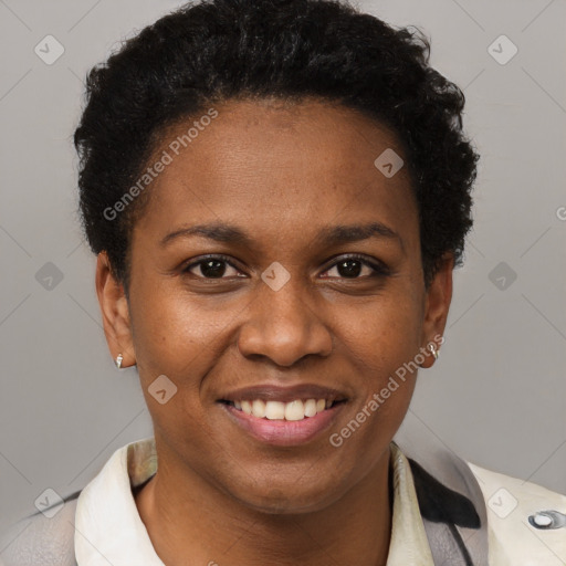 Joyful black young-adult female with short  brown hair and brown eyes