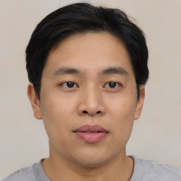 Neutral asian young-adult male with short  black hair and brown eyes