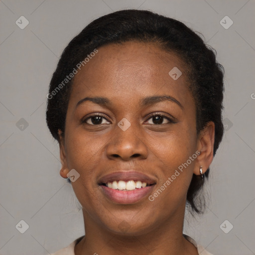 Joyful black young-adult female with medium  black hair and brown eyes