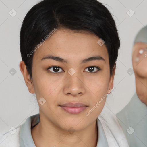 Joyful asian young-adult female with medium  brown hair and brown eyes