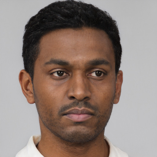 Neutral black young-adult male with short  black hair and brown eyes