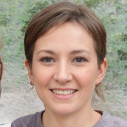 Joyful white young-adult female with medium  brown hair and grey eyes