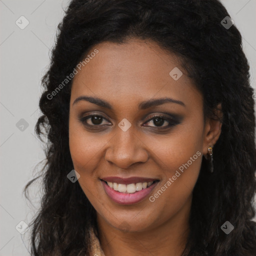 Joyful black young-adult female with long  brown hair and brown eyes