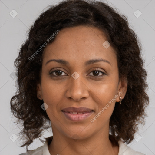 Joyful black young-adult female with medium  brown hair and brown eyes