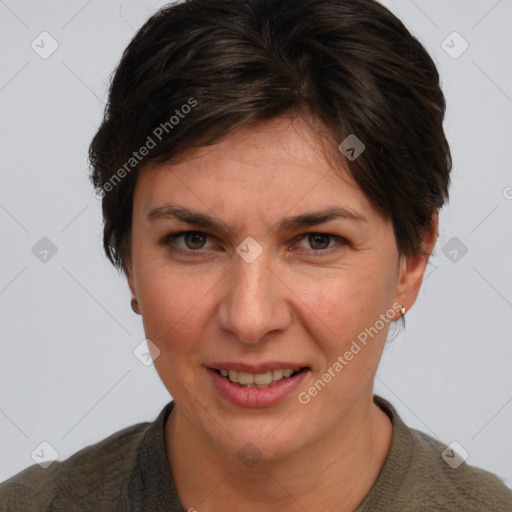 Joyful white adult female with short  brown hair and brown eyes