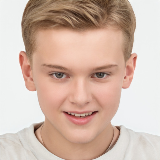 Joyful white child male with short  brown hair and brown eyes