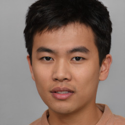 Neutral asian young-adult male with short  brown hair and brown eyes