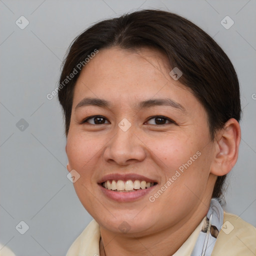 Joyful white adult female with short  brown hair and brown eyes