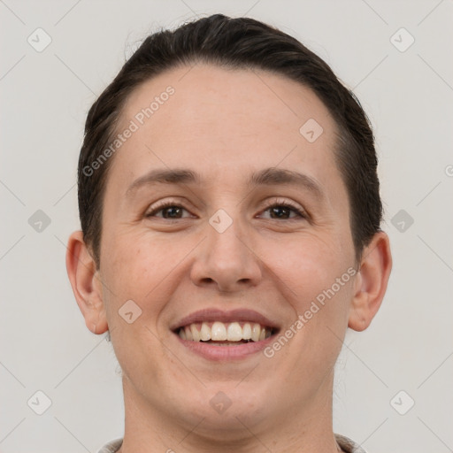 Joyful white young-adult female with short  brown hair and brown eyes