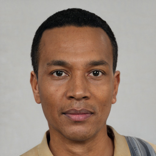 Neutral black young-adult male with short  black hair and brown eyes
