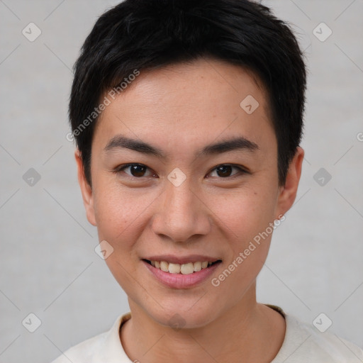 Joyful asian young-adult female with short  brown hair and brown eyes