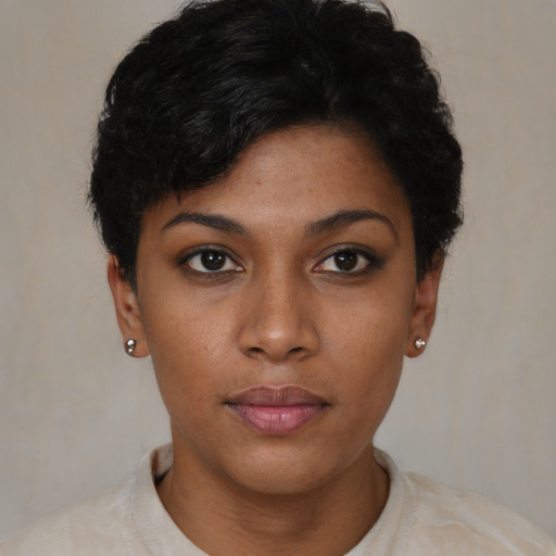 Neutral black young-adult female with short  black hair and brown eyes