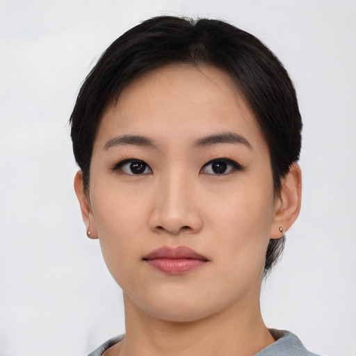 Neutral asian young-adult female with short  black hair and brown eyes