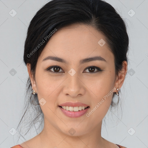 Joyful asian young-adult female with medium  brown hair and brown eyes