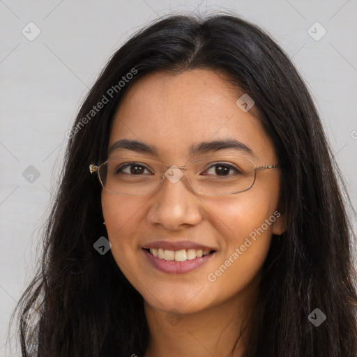 Joyful asian young-adult female with long  brown hair and brown eyes