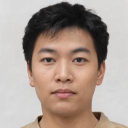 Neutral asian young-adult male with short  black hair and brown eyes