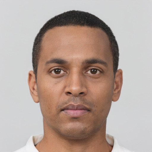 Neutral black young-adult male with short  black hair and brown eyes