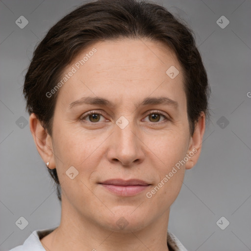 Joyful white adult female with short  brown hair and brown eyes