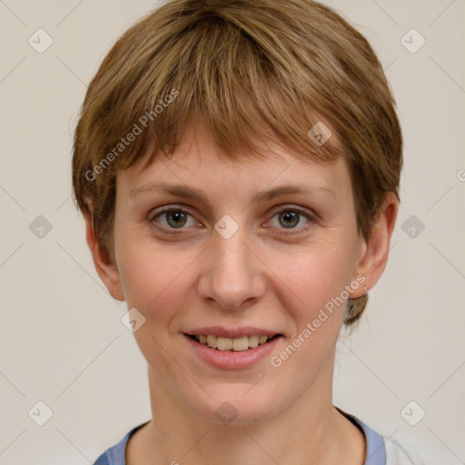 Joyful white young-adult female with short  brown hair and grey eyes