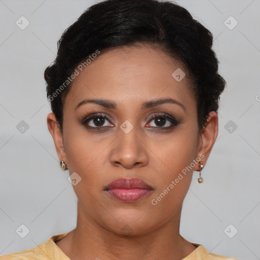 Joyful latino young-adult female with short  brown hair and brown eyes