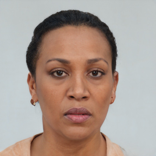 Neutral black adult female with short  brown hair and brown eyes